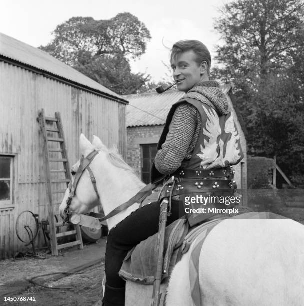 On set with the cast of the television series The Adventures of Sir Lancelot. William Russell Stars as Sir Lancelot and is seen here on horseback ....