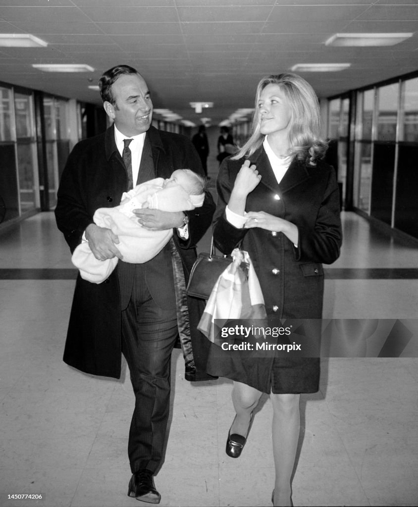 Rupert Murdoch with his wife Anna and their three month old daughter