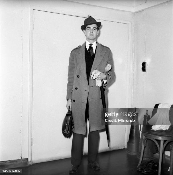 Actor Derek Nimmo dressed as a city gent. March 1957.