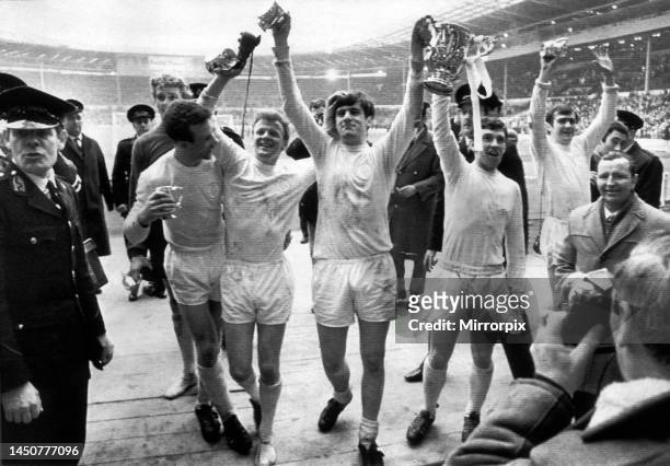 Leeds United 1 v Arsenal 0. Leeds players Gary Sprake, Paul Reaney, Billy Bremner, Peter Lorimer, Johnny Giles and Terry Cooper show off the trophy...