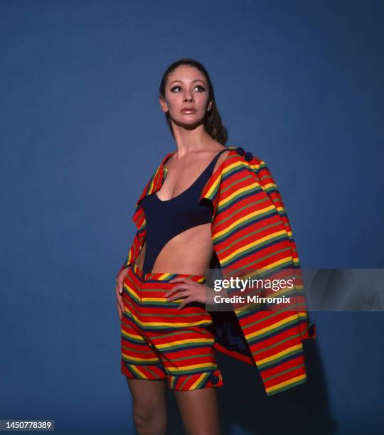 Sixties Fashion - Woman wearing rainbow coloured striped top and shorts outfit Striped bright combination Irish Euro-Fashion by Glynis Miller. March...
