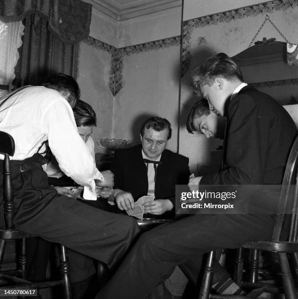 Youth Culture Teddy boy Tony Reuter leader of the Elephant Boys gang seen here playing cards 1955.