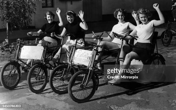 Butlins L-R, Peggy Brown and Joan Smith of South Wales and right Margaret Jones and Marry Etherington of Preston have fun on social cycles. July 1954.