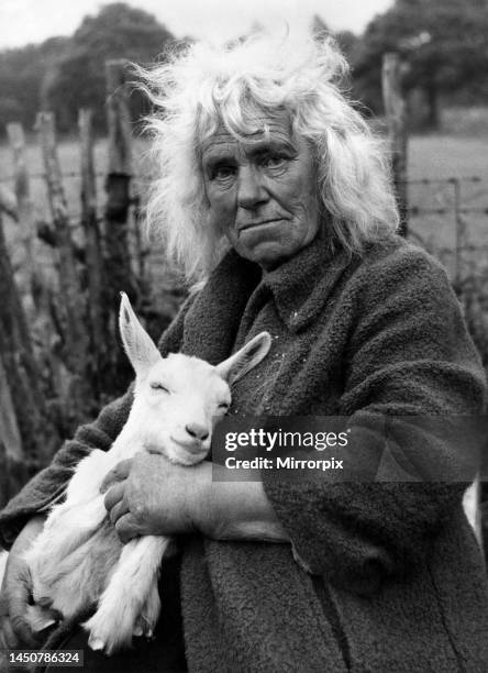 Miss Thompson with Miranda - one of her 50 goats. December 1954.