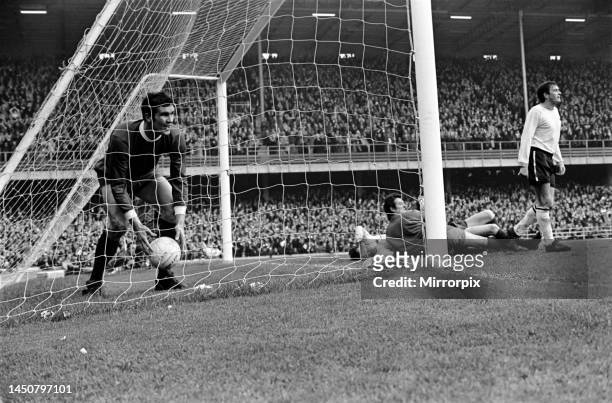 Derby versus Liverpool. Ron Yeats picks ball from net. November 1969.