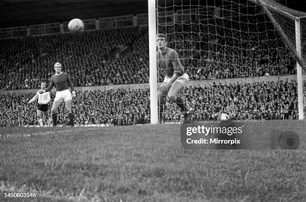 Manchester United versus Stoke City. Alex Stepney can only stop and watch as the ball hits the post and rebounds to safety from a shot by Dobing....