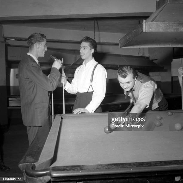 Youth Culture Teddy boy Tony Reuter leader of the Elephant Boys gang, seen here playing snooker1955.