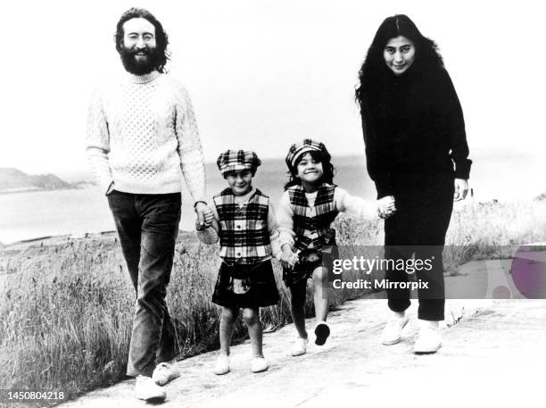 John Lennon and Yoko Ono with their children from previous marriages Julian Lennon and daughter Kyoko pictured taking a walk during their Scottish...