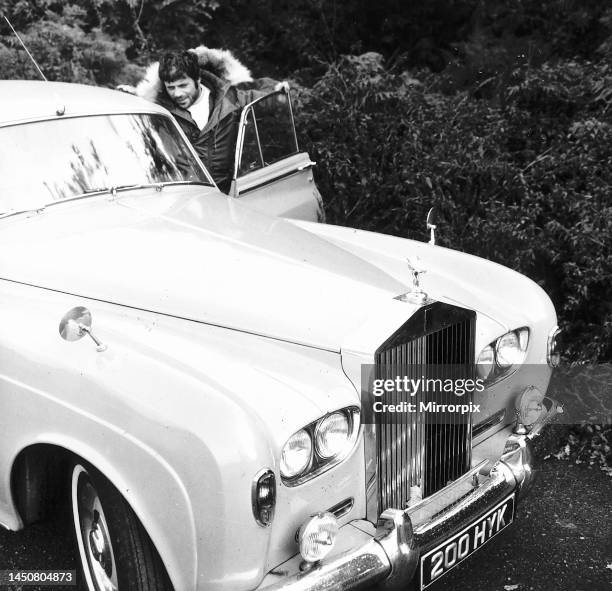 Oliver Reed with his Rolls Royce after Goblin hunting on Wimbledon Common. October 1969.