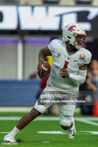 Cameron Ward of Washington State runs out of the pocket during the LA Bowl game between Washington State Cougars and Fresno State Bulldogs at SoFi...