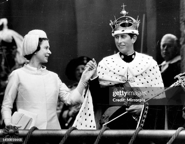 Charles Prince of Wales Investiture at Caernarfon, July 1969. Wearing ermine cloak, holding hands with the Queen.