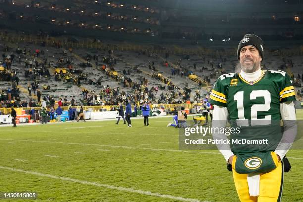 Aaron Rodgers of the Green Bay Packers walks off the field after defeating the Los Angeles Rams 24-12 at Lambeau Field on December 19, 2022 in Green...