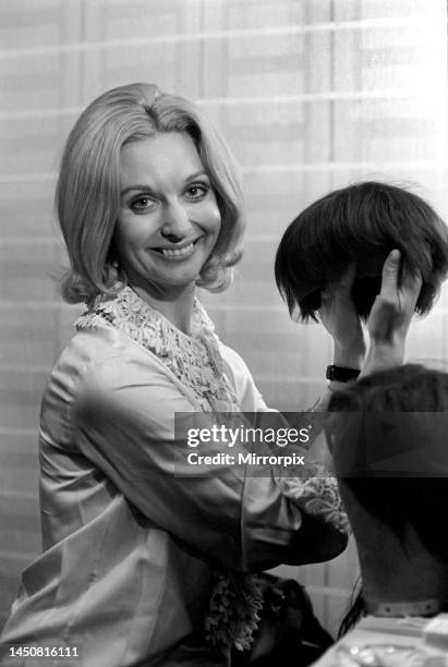 Nyree-Dawn Porter with the wig she wears playing the part of Joan of Arc. 28th October 1969.