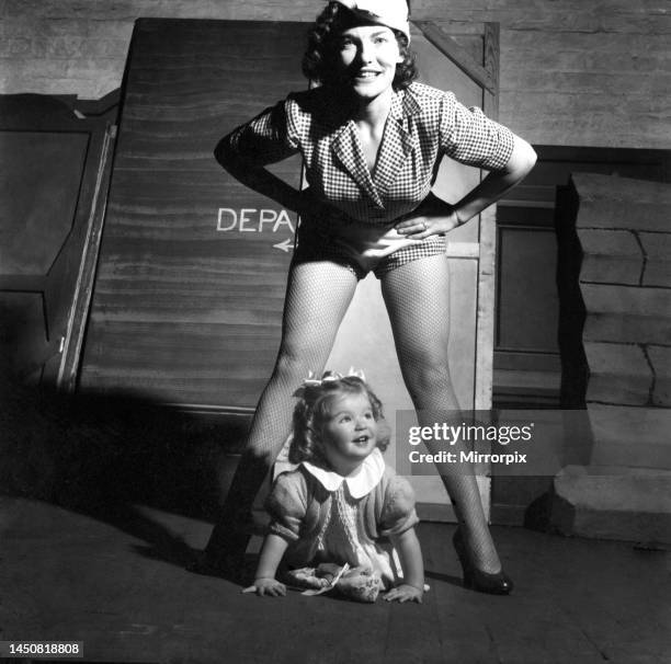 Sheila Hannaway, principal boy in Dick Whittington at Glasgow with her 2 year old daughter December 1953.