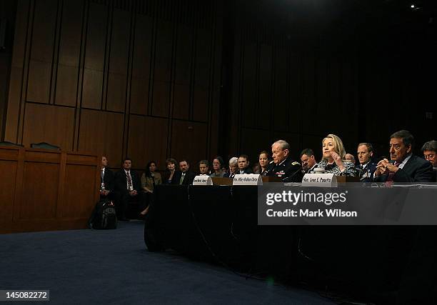 Secretary of State Hillary Clinton speaks as U.S. Defense Secretary Leon Panetta , and Chairman of the Joint Chiefs of Staff Martin Dempsey...