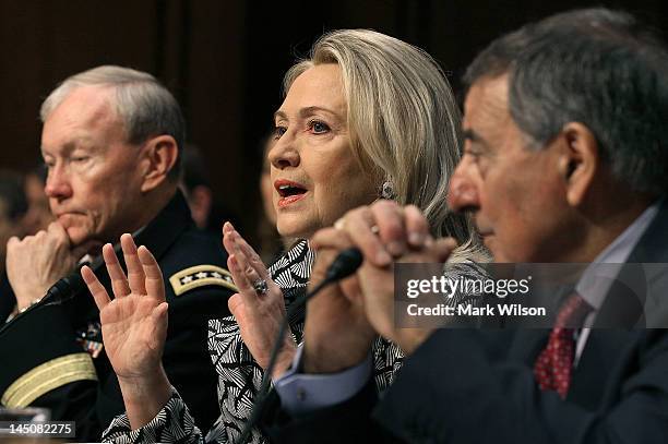 Secretary of State Hillary Clinton speaks as U.S. Defense Secretary Leon Panetta , and Chairman of the Joint Chiefs of Staff Martin Dempsey...