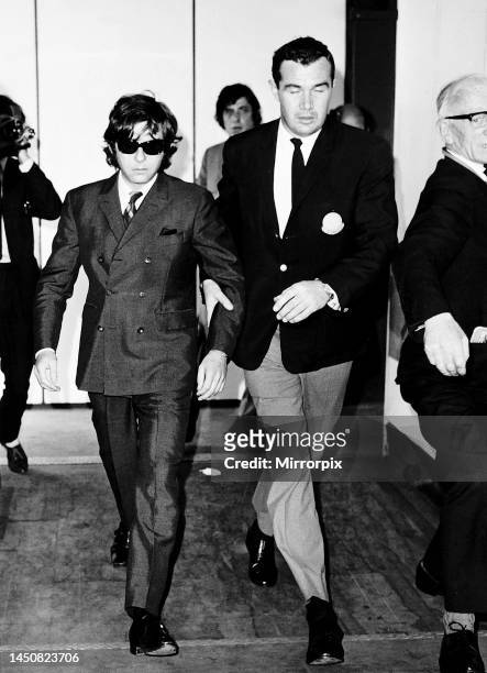 Film director Roman Polanski seen leaving Heathrow Airport for Los Angeles after hearing that wife, film star Sharon Tate, had been murdered. 11th...
