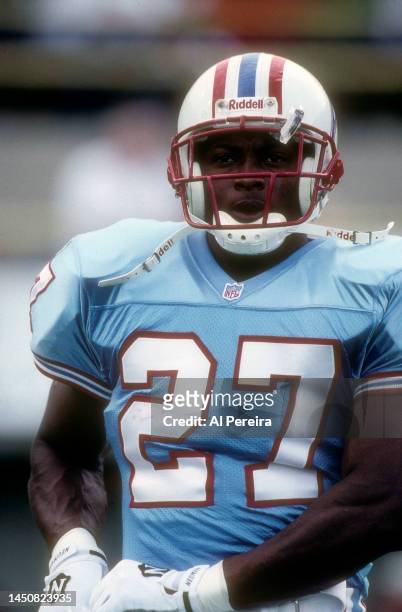 Running Back Eddie George of the Houston Oilers follows the action in the game between the Houston Oilers vs the New York Jets at Mississippi...