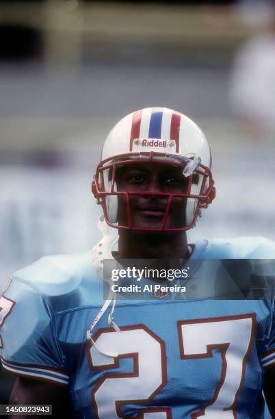 Running Back Eddie George of the Houston Oilers follows the action in the game between the Houston Oilers vs the New York Jets at Mississippi...