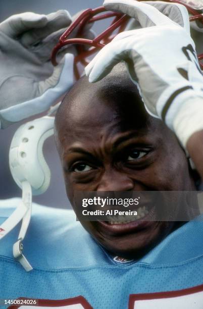 Running Back Eddie George of the Houston Oilers follows the action in the game between the Houston Oilers vs the New York Jets at Mississippi...