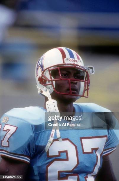 Running Back Eddie George of the Houston Oilers follows the action in the game between the Houston Oilers vs the New York Jets at Mississippi...