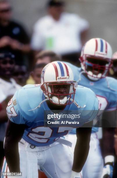 Running Back Eddie George of the Houston Oilers follows the action in the game between the Houston Oilers vs the New York Jets at Mississippi...