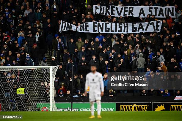 Leicester City fans hold up a banner during the Carabao Cup Fourth Round match between Milton Keynes Dons and Leicester City at Stadium mk on...