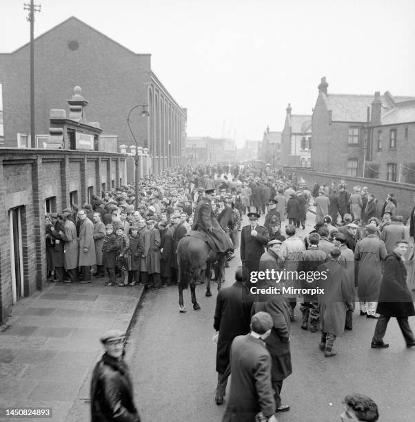 Fulham fans queue at Craven Cottage as tickets for their FA Cup match against Charlton go on sale. February 1958.