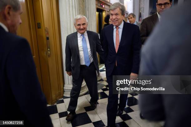 Sen. Jack Reed and Sen. Roy Blunt head for the Senate Chamber for a procedural vote on the bipartisan federal omnibus spending legislation at the...
