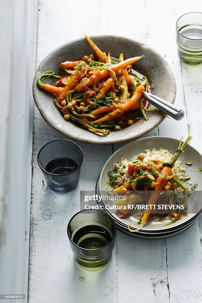 Plates of carrots and vegetables