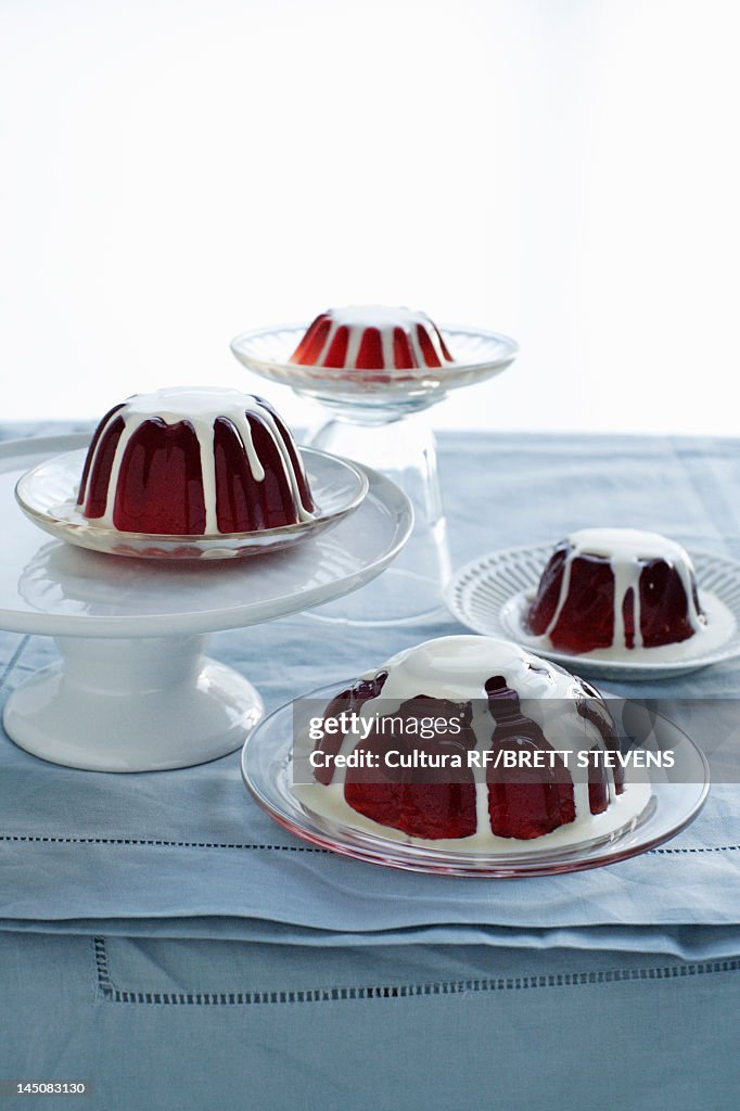 Plates of jello pudding with cream