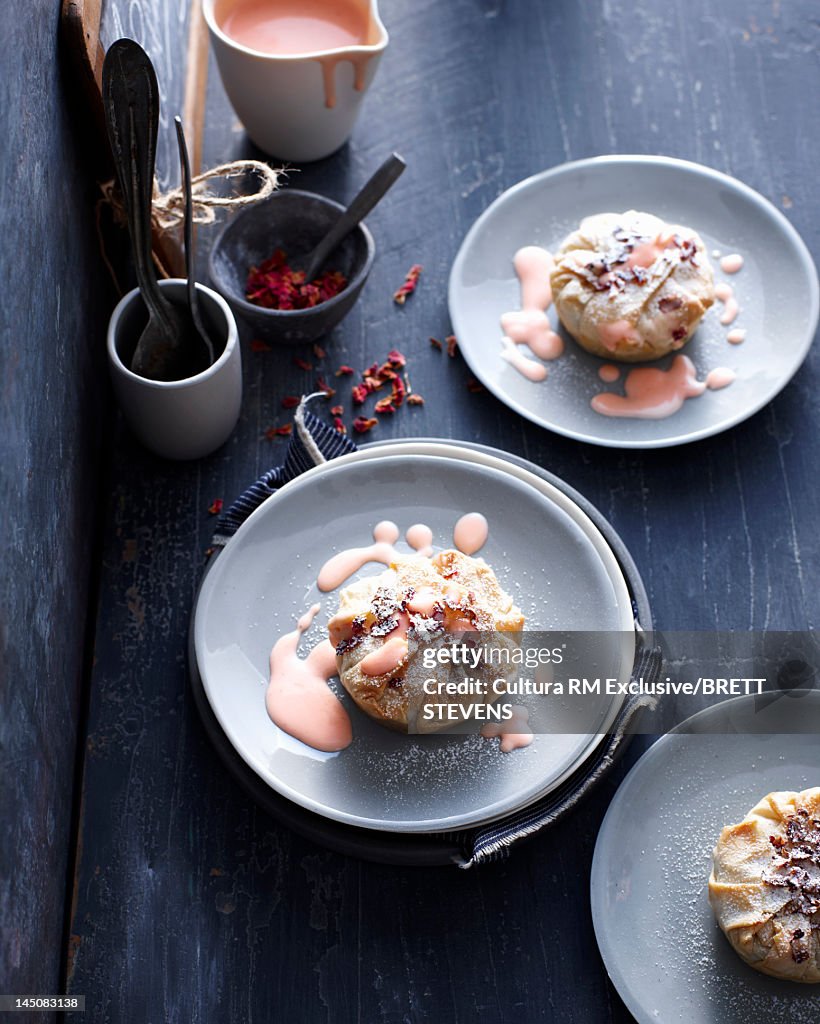 Plates of nut pastries with cream