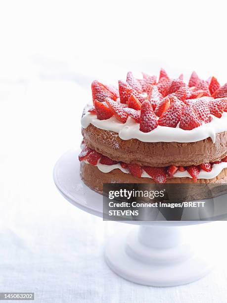 raspberry layer cake on platter - serving dish on white stock pictures, royalty-free photos & images