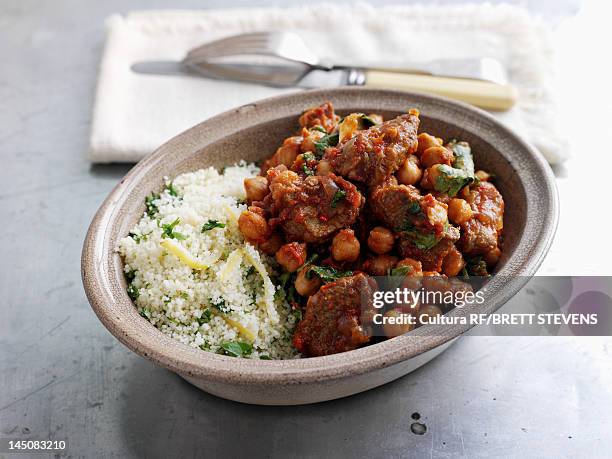 bowl of couscous, meat and chick peas - beef stew stock pictures, royalty-free photos & images
