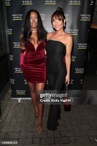 April Banbury seen attending Protein World launch event at Chelsea FunHouse on December 20, 2022 in London, England.