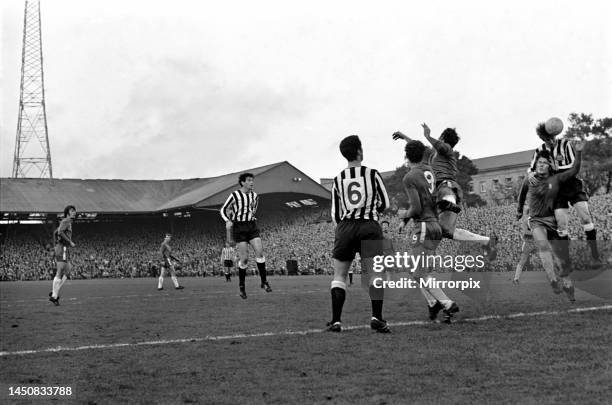 Newcastle United versus Chelsea: Wynn Davies with his hands on the face of David Webb, as the Chelsea centre-half heads for goal. Transfer fees...