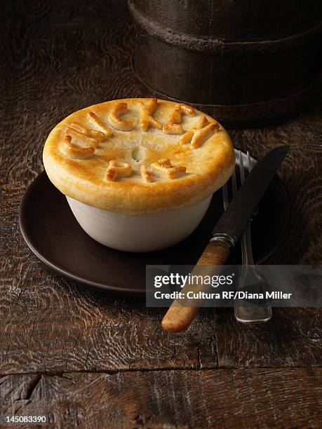 plate of chicken pies - meat pie stockfoto's en -beelden