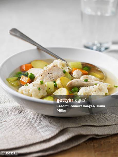 bowl of chicken vegetable soup - green pea soup stock pictures, royalty-free photos & images