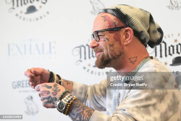 Singer Ivan Moody of Five Finger Death Punch poses during an appearance to celebrate the unveiling of his new cannabis wellness line "Greenings by...