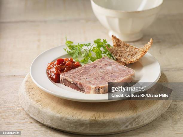 plate of pork terrine with chutney - pate foto e immagini stock
