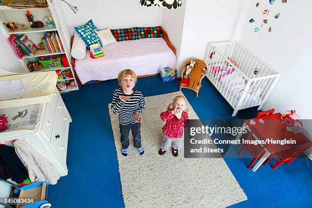 children standing in clean nursery - kid looking at camera stock pictures, royalty-free photos & images