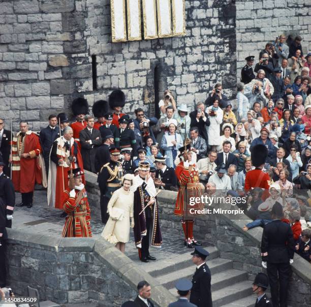 Investiture of Prince Charles as Prince of Wales Queen Elizabeth and Prince Charles leaving Caernarfon Castle after the ceremony.