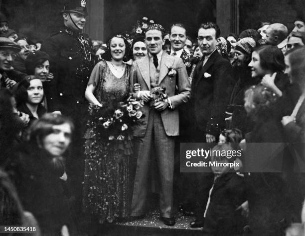 Jackie Brown, the European and English Flyweight Champion with his bride , Miss Mary Chapman leaving St. Patrick's Church, Collyhurst, after the...