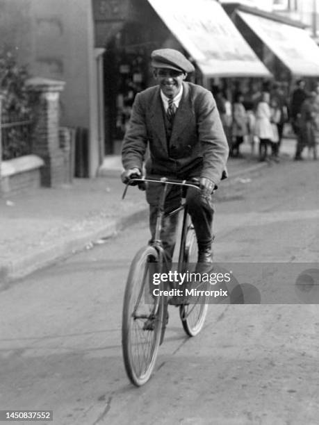 Stoker Putland a witness in the Emily Kaye murder trial, also know as the Eastbourne Bungalow Murder. , seen here riding his bike away from the...