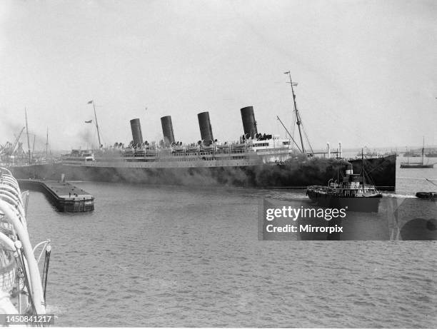 Aquitania seen here leaving Southampton with a crew of volunteer stewardsThe Aquitania was built by John Brown & Co, Glasgow in 1913 for the Cunard...