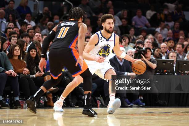 Klay Thompson of the Golden State Warriors drives the ball against Jalen Brunson of the New York Knicks during the second quarter of the game at...