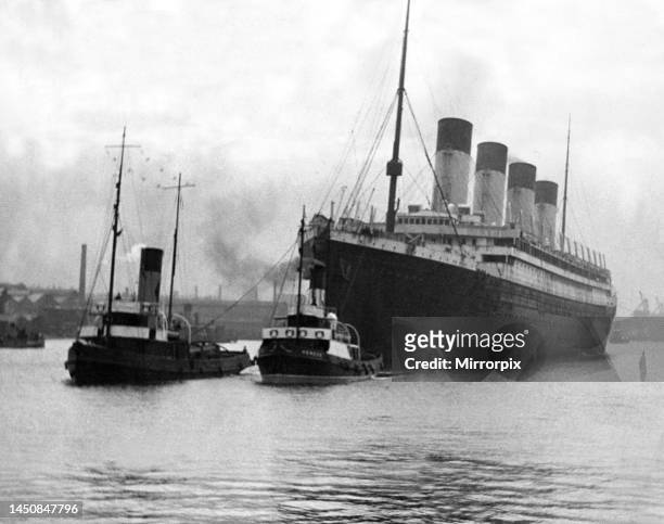 The ocean liner RMS Olympic proceeding up the River Tyne to Jarrow, where she is to be broken up. Circa 1935.