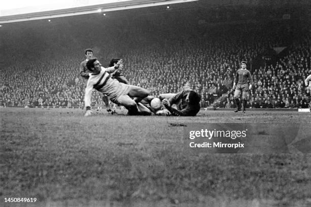 English League Division One match at Anfield. Liverpool versus West Ham United. Tommy Lawrence, Ron Yeats and West Hams Trevor Brooking collide...