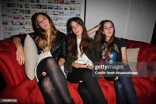 Musicians Este Haim, Danielle Haim, and Alana Haim of HAIM attend the Nudie Jeans event at the Palihouse on May 22, 2012 in West Hollywood,...