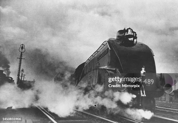 Standing proud is the Canadian Pacific Railway issue steam-operated bell, on the distinctive wedge-shaped air-smoothed front of Gresley A4 pacific...